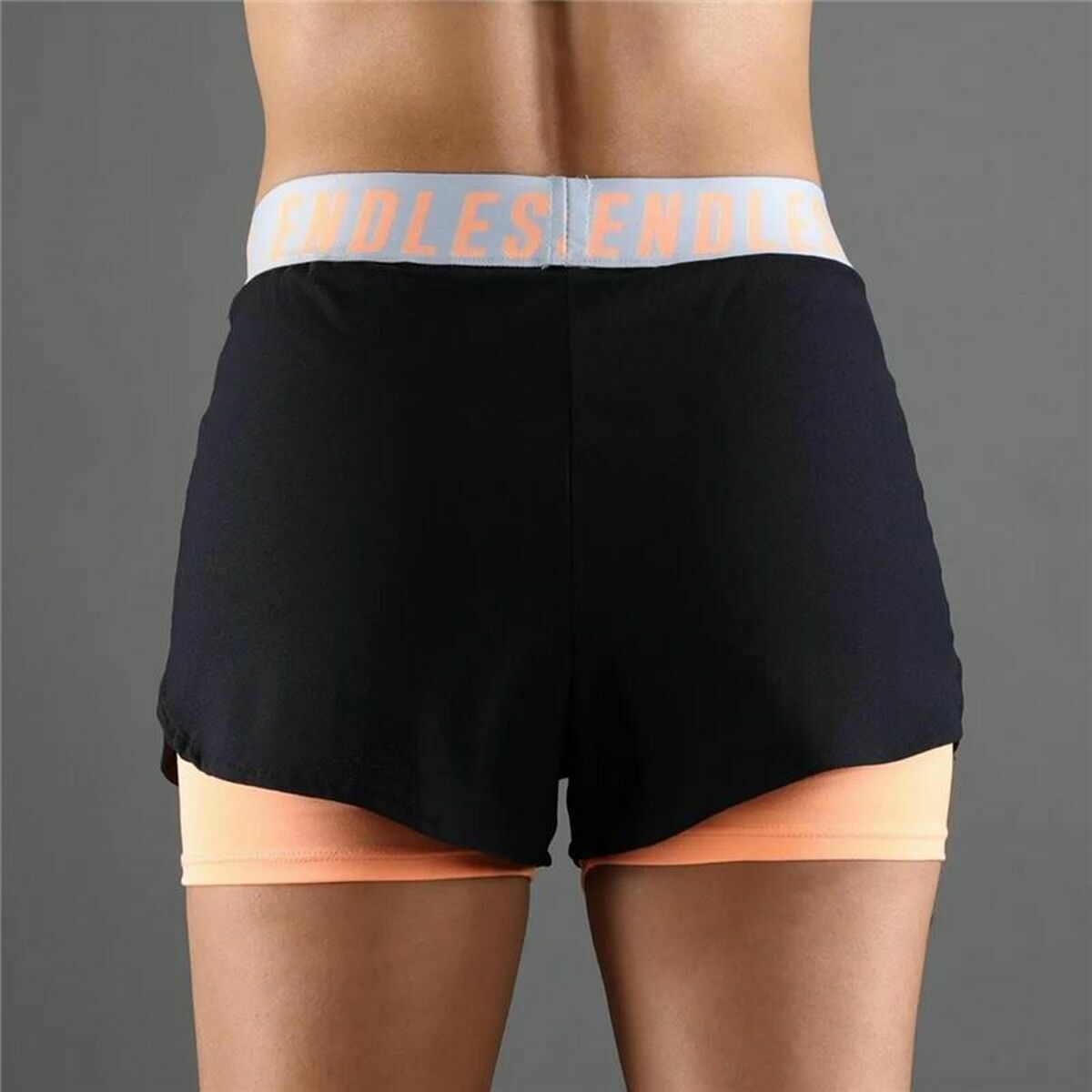 Pantaloncini Sportivi da Donna Endless Tech Iconic Arancio Nero